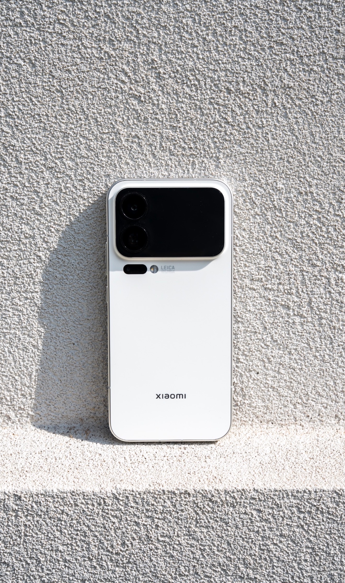 Xiaomi 17 Pro Max against textured stone